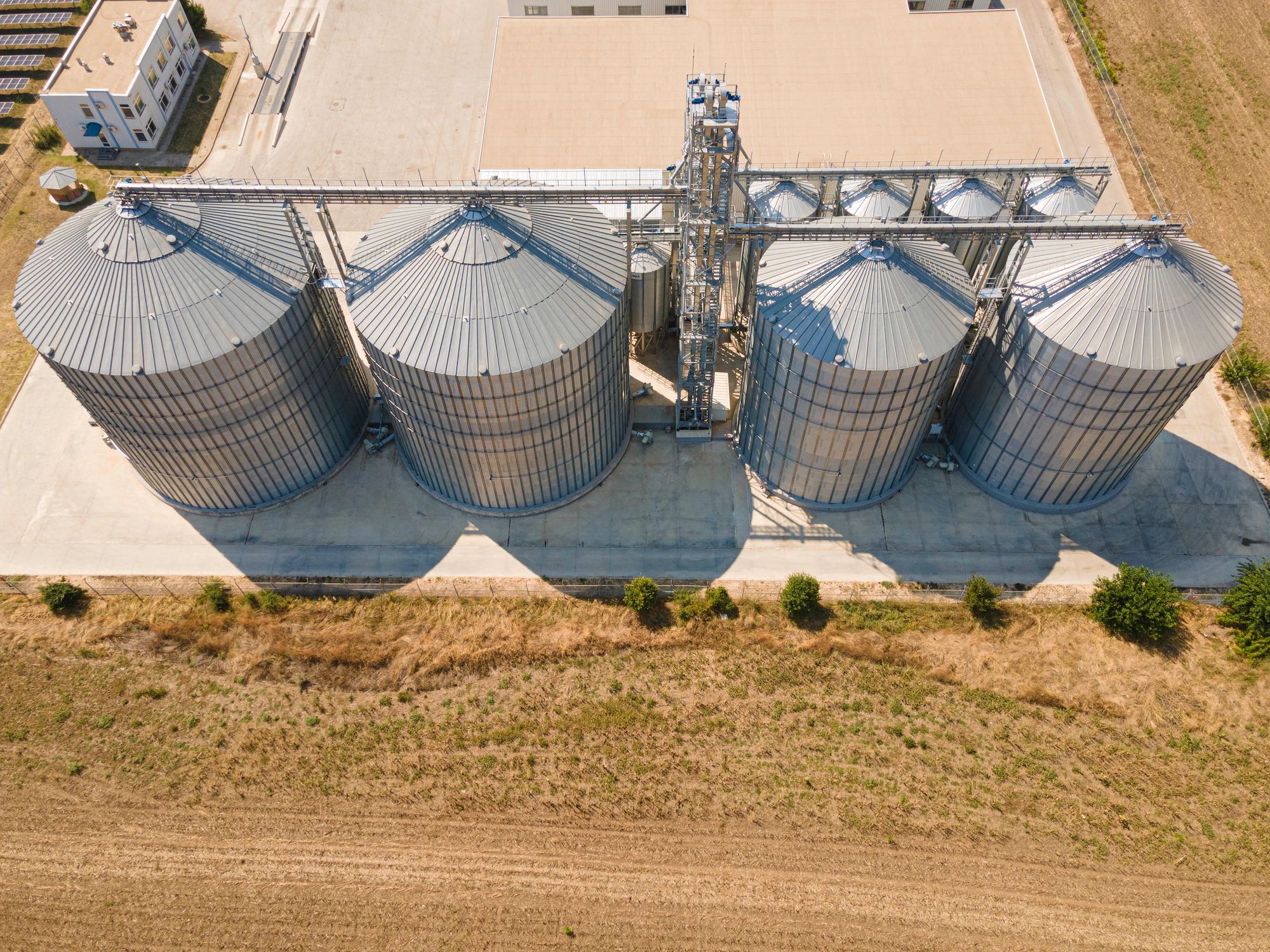 Industrial grain silos and facility representing reliable production capacity